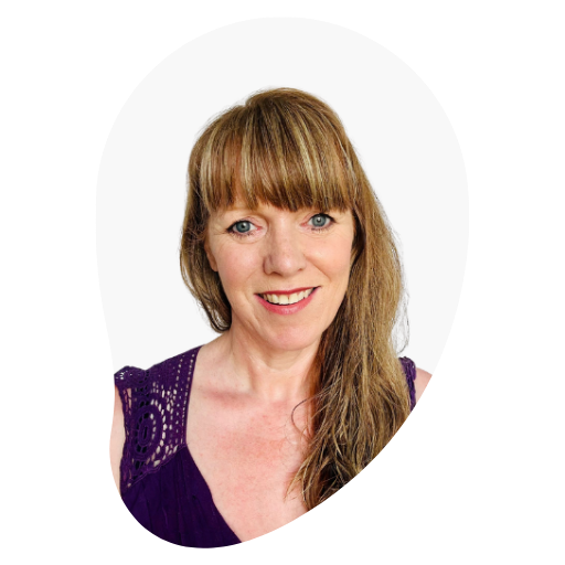 A picture of Annique. Caucasian, long auburn hair, blue eyes, She/Her